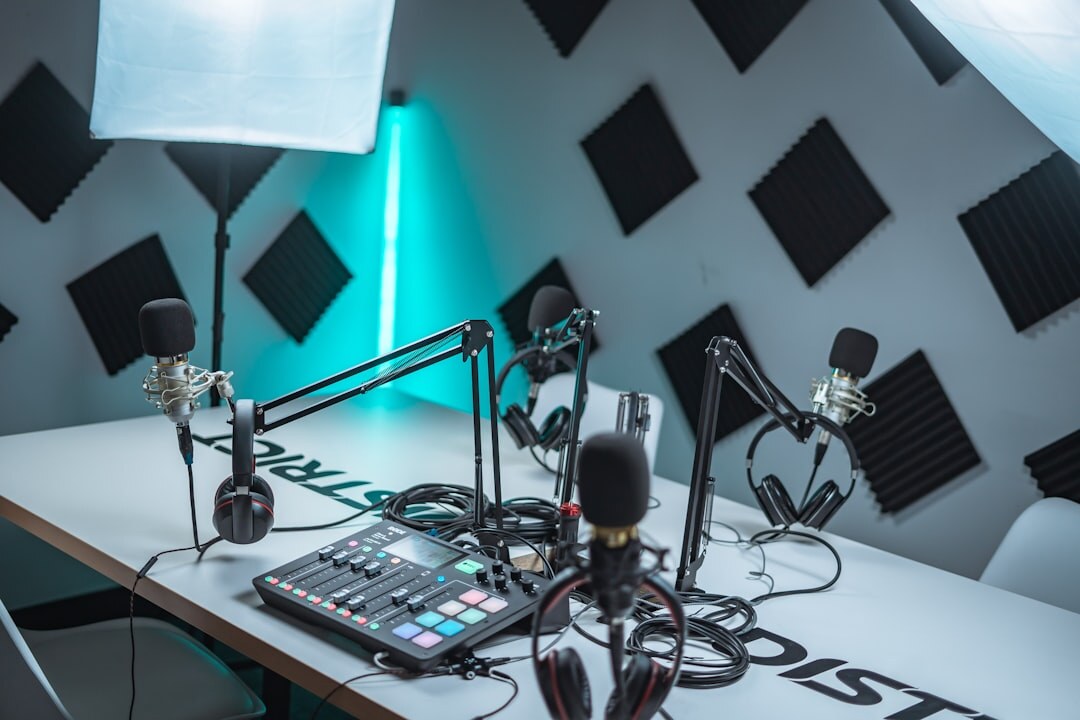 Professional podcast studio equipment including headphones and audio interface